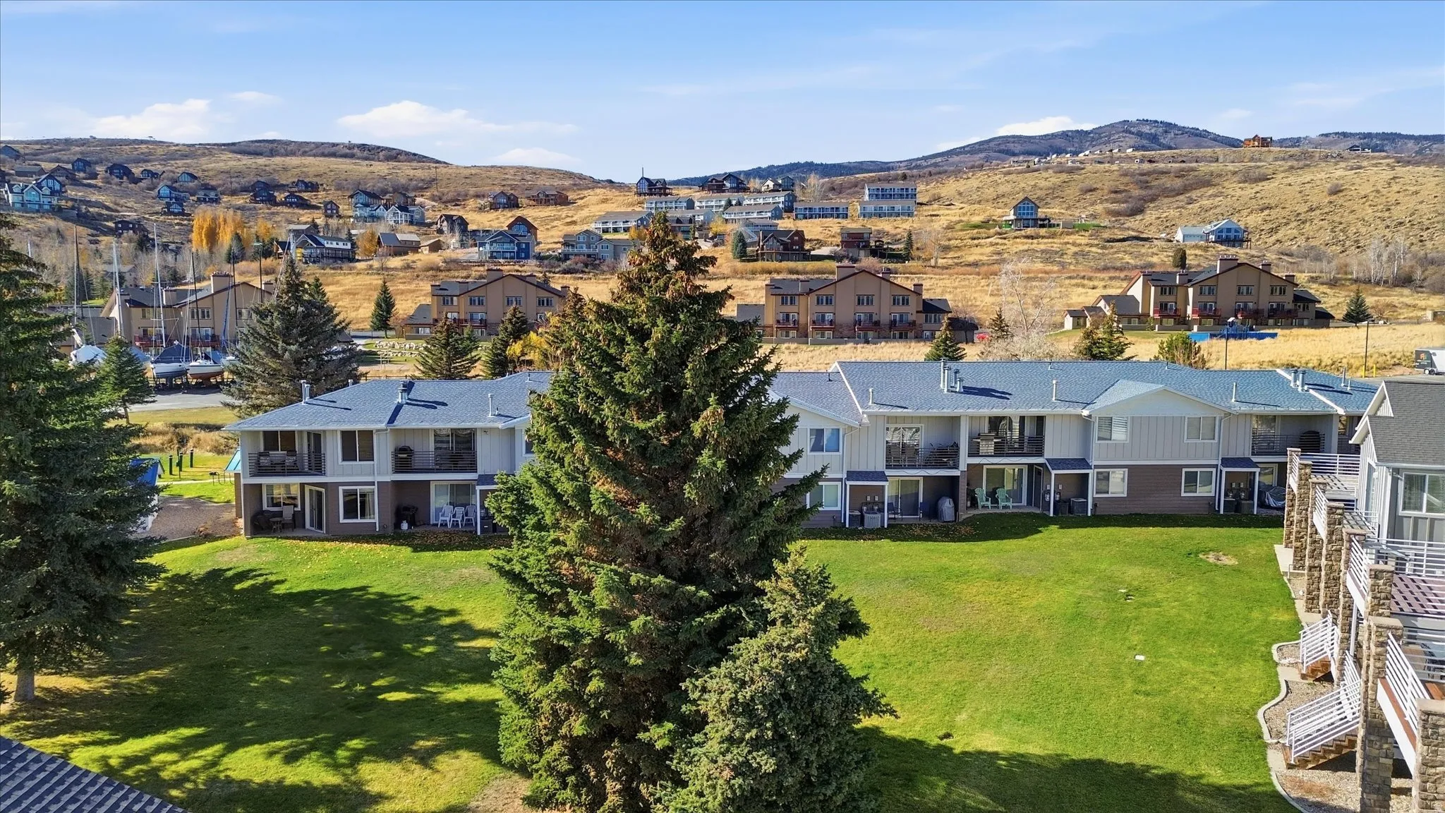 Aerial perspective of suburban area with mountains