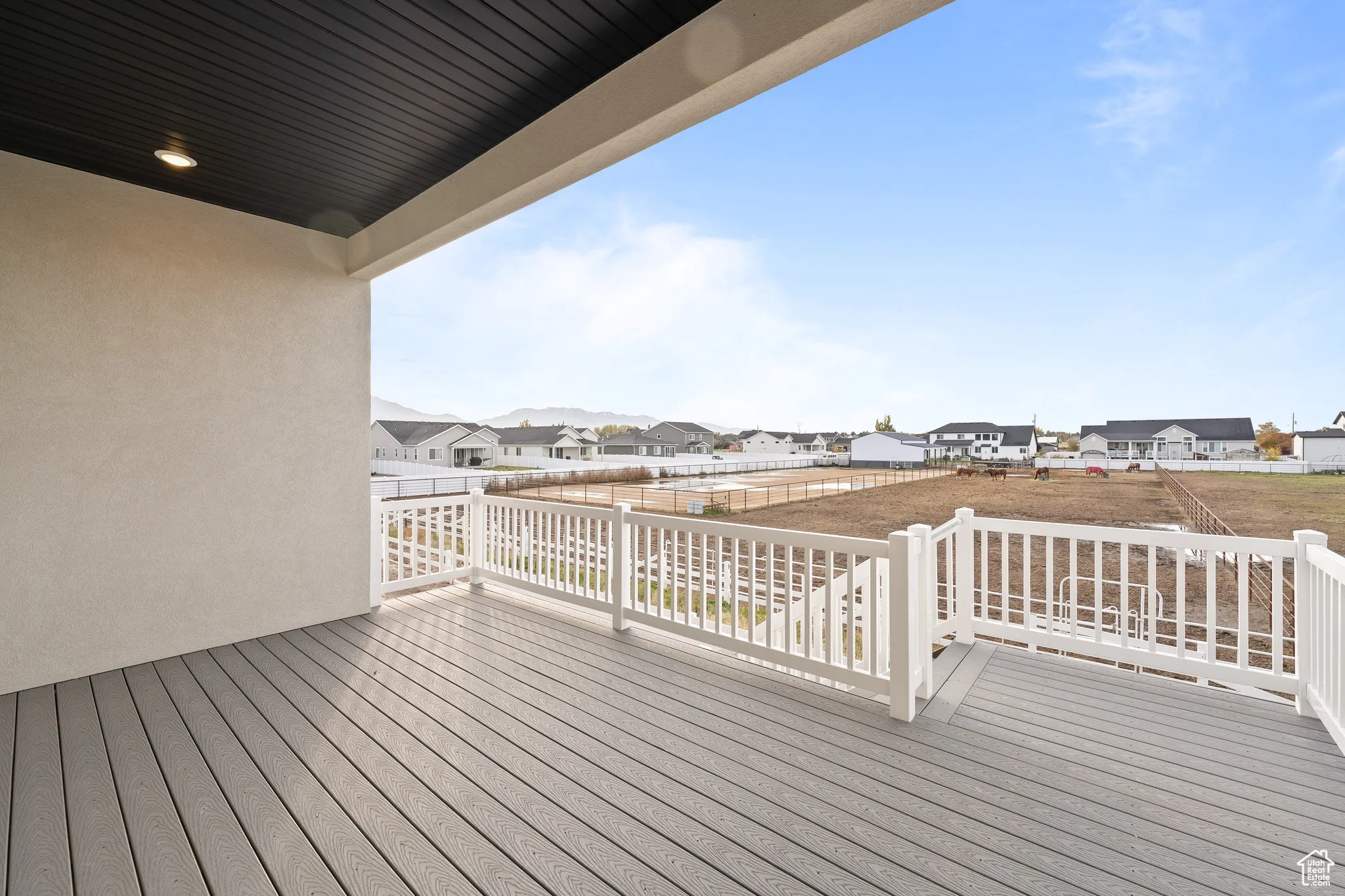 Wooden deck featuring a residential view