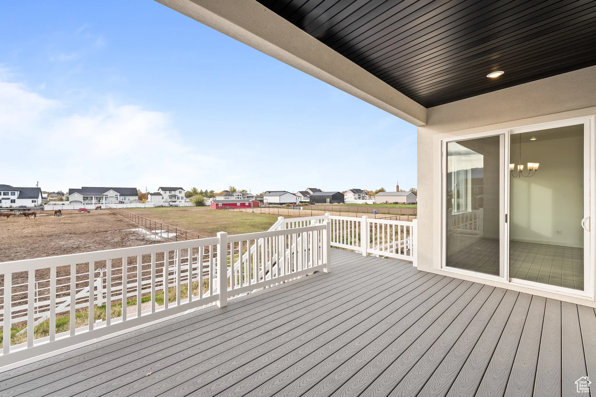 Wooden deck with a residential view