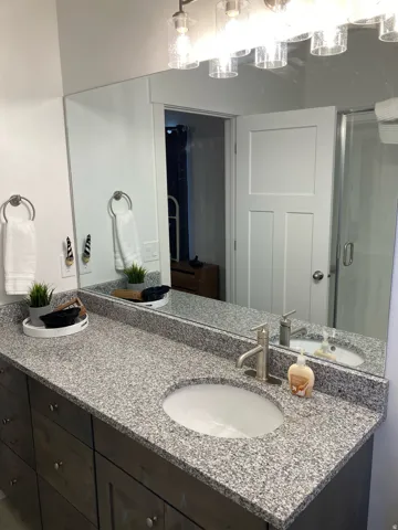 Full bathroom with double vanity