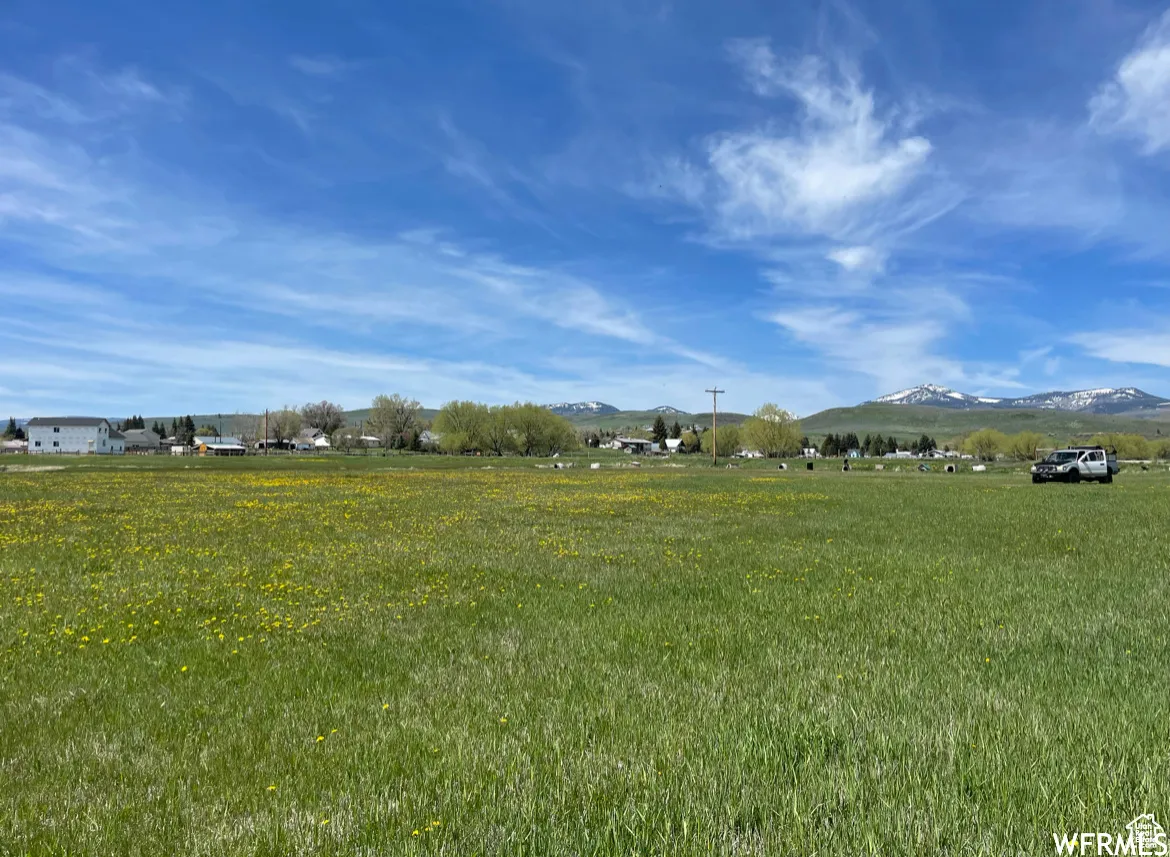 View of community featuring a mountain view and a view of countryside