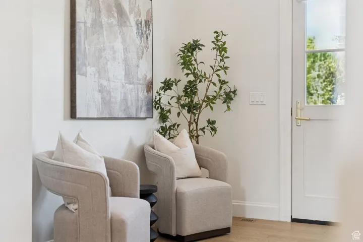 Sitting room featuring wood finished floors and baseboards