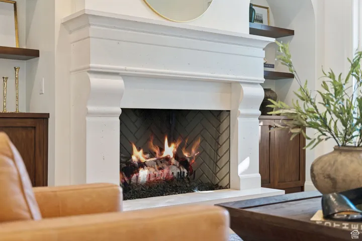 Detailed view of a warm lit fireplace