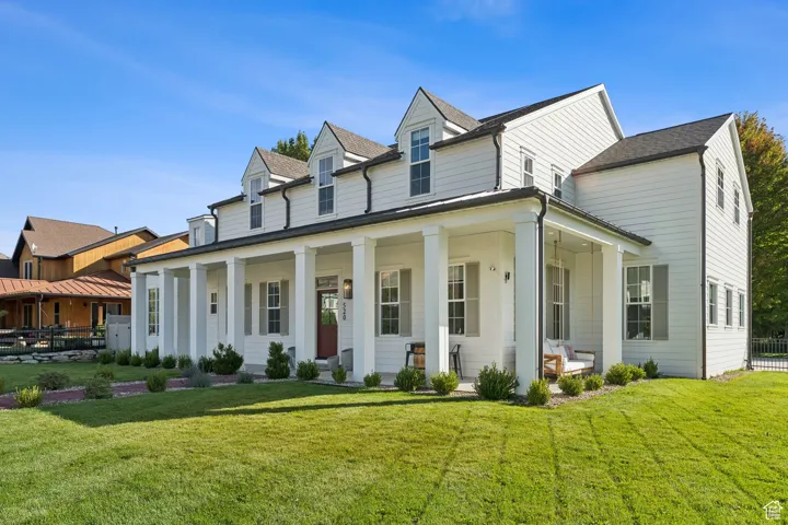 View of front facade featuring covered porch