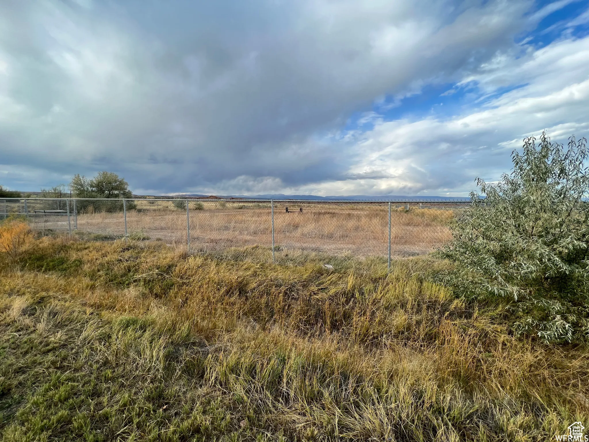 View of yard featuring a view of rural / pastoral area