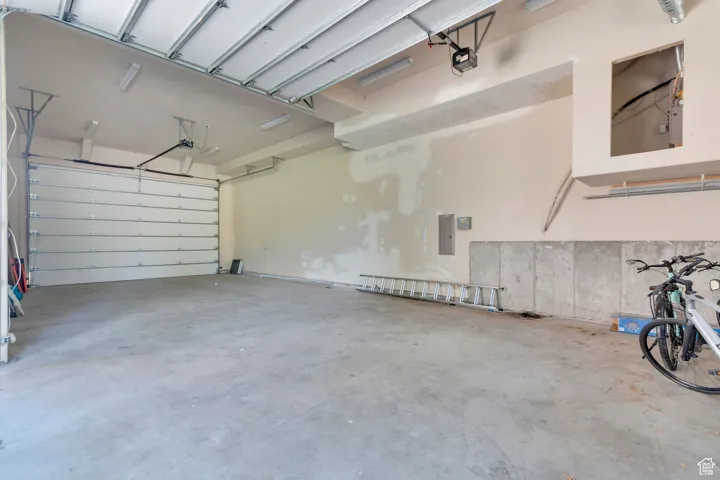 Garage featuring electric panel
