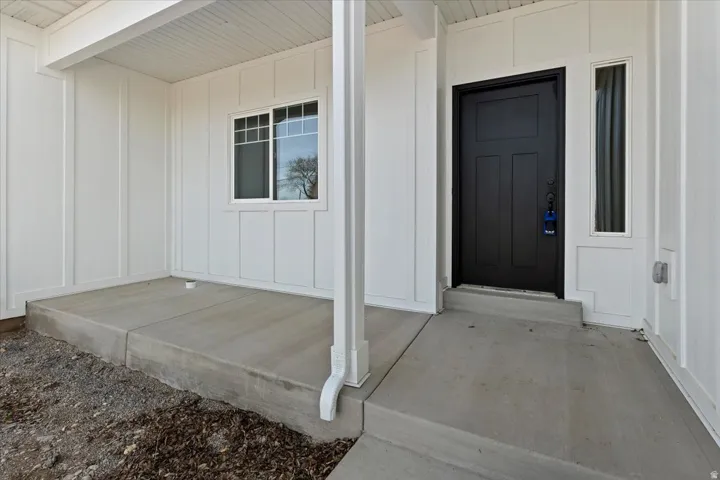 Covered Front Porch with Room to Relax and Enjoy the Views