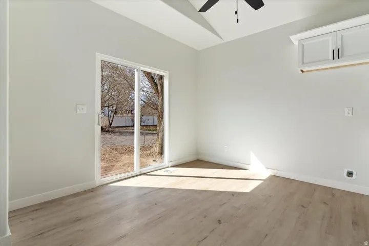 Dining Area with Sliding Door to Backyard.