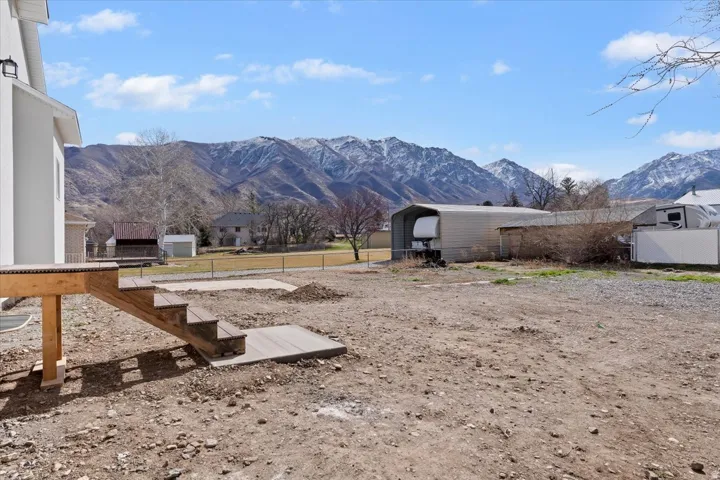 Backyard View with Stairs from Dining Area.