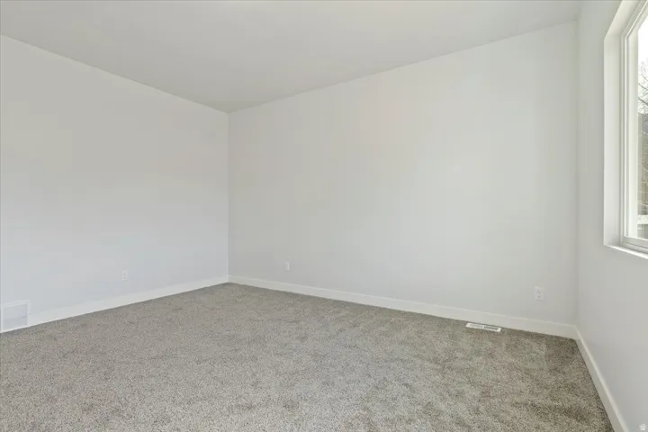 Large Master/Primary Suite with Vaulted Ceiling.