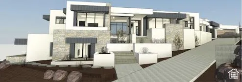 View of front of property with stone siding