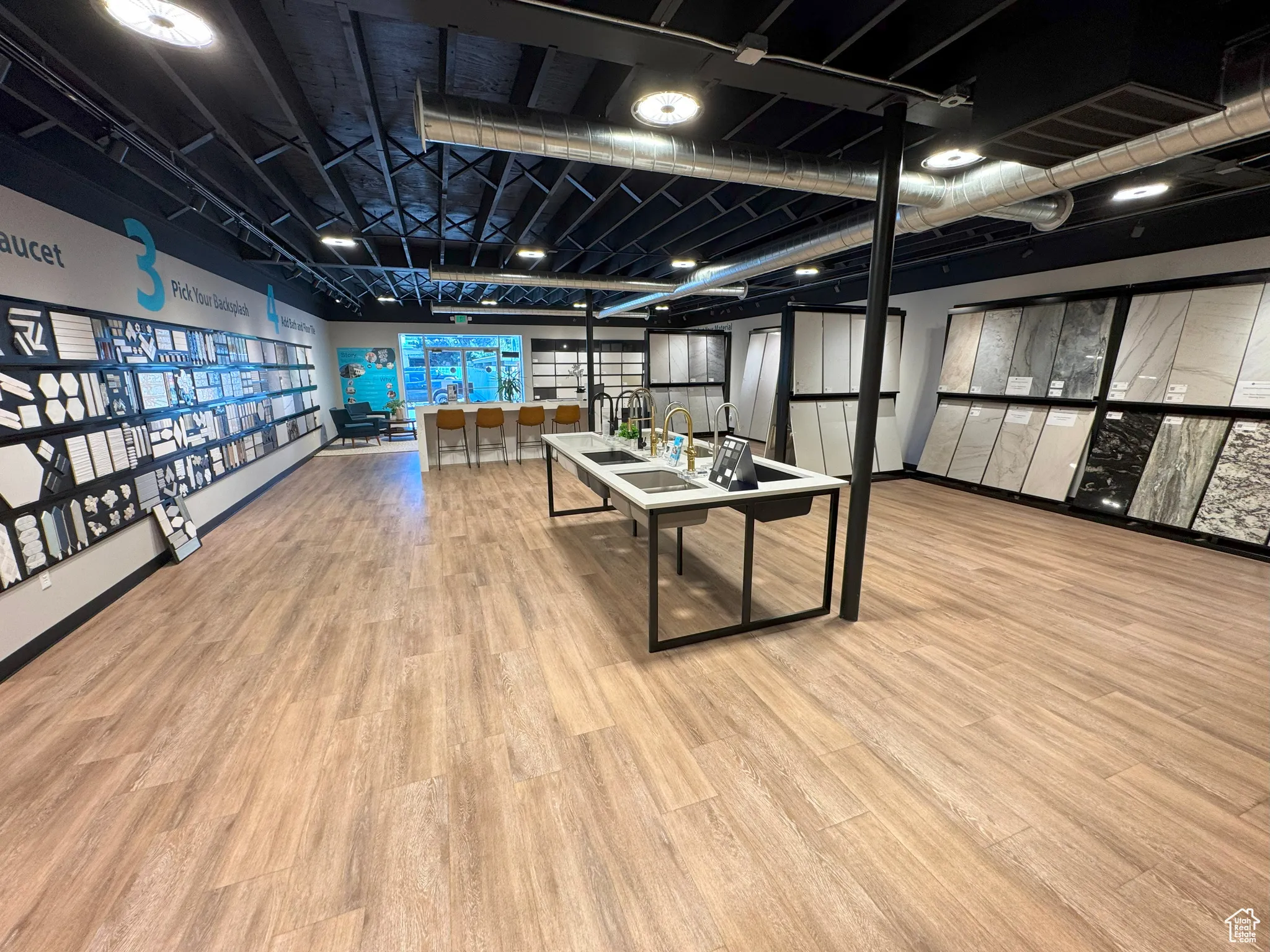 Rec room featuring light wood-type flooring