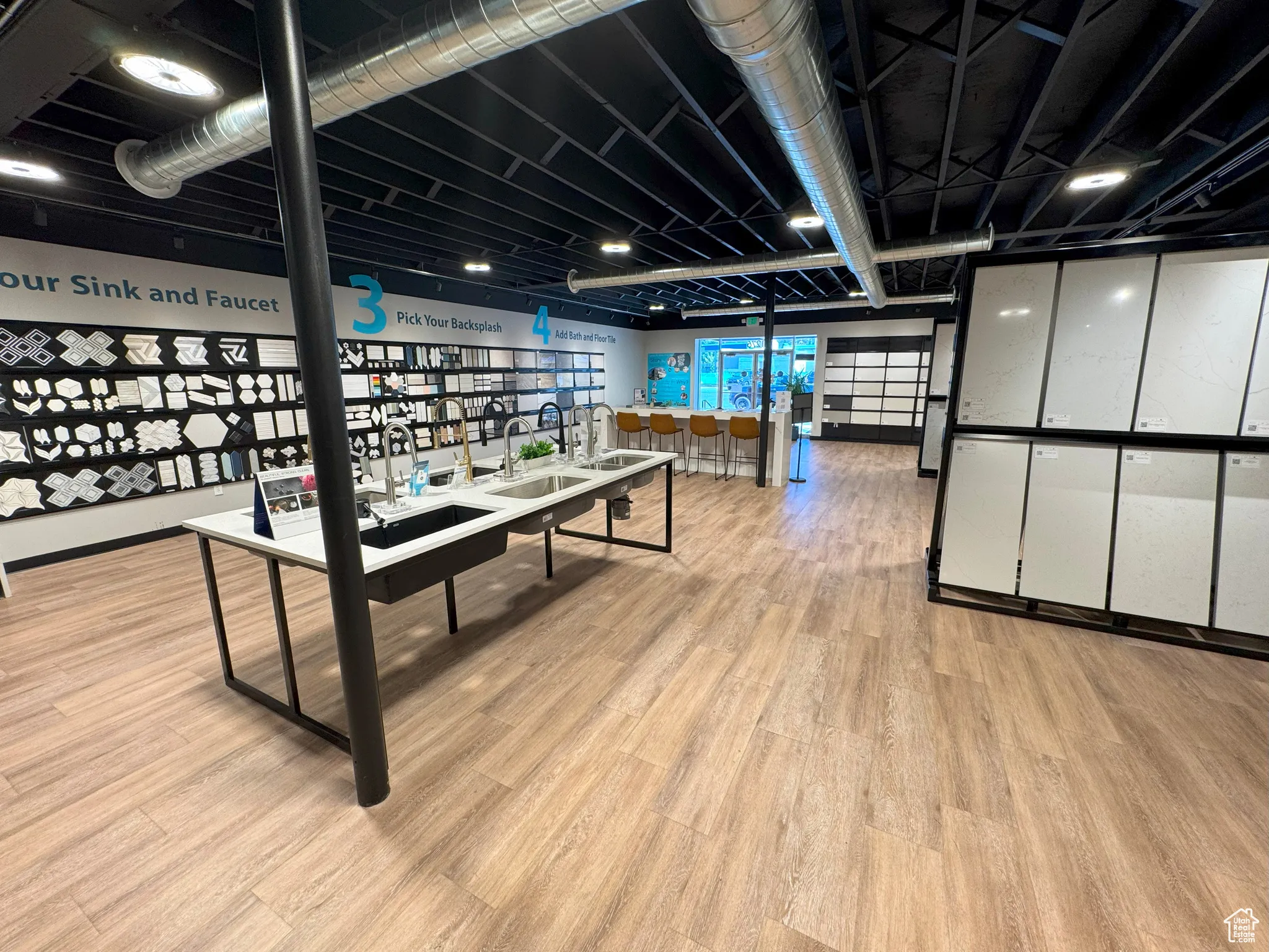 Game room featuring light wood-style floors