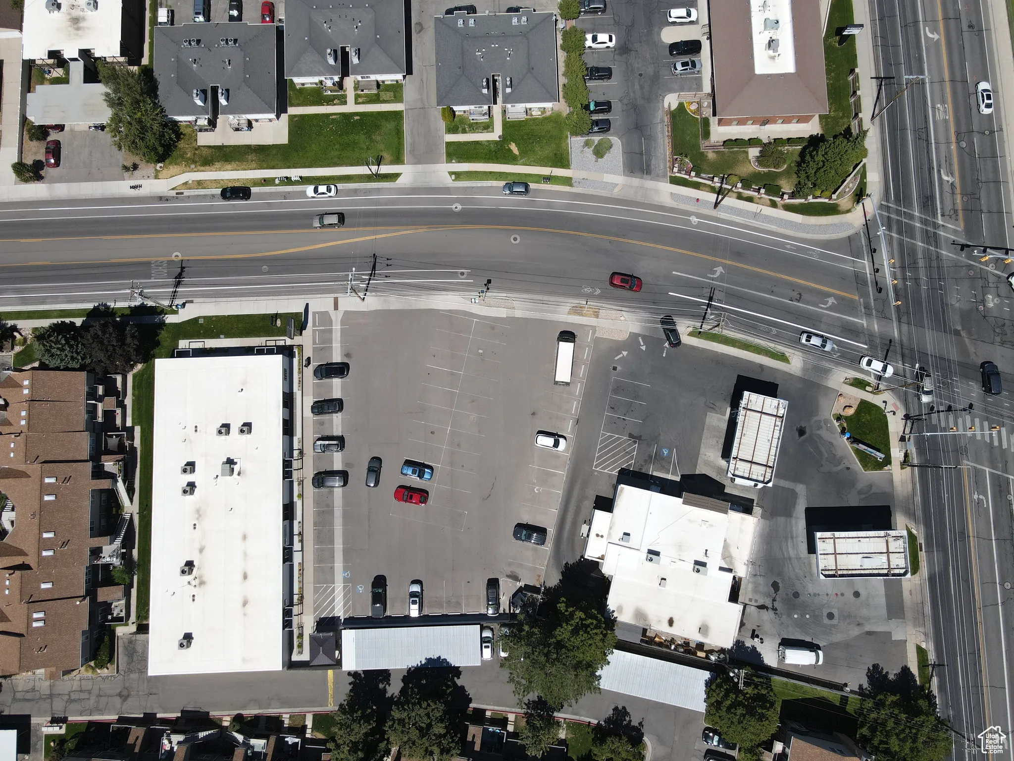 Aerial overview of property's location featuring nearby suburban area