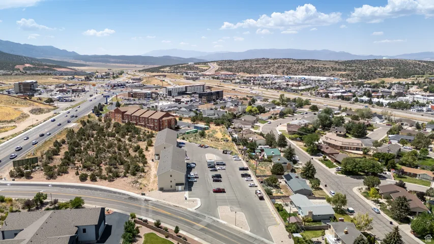 Bird's eye view of a major roadway and a mountainous background