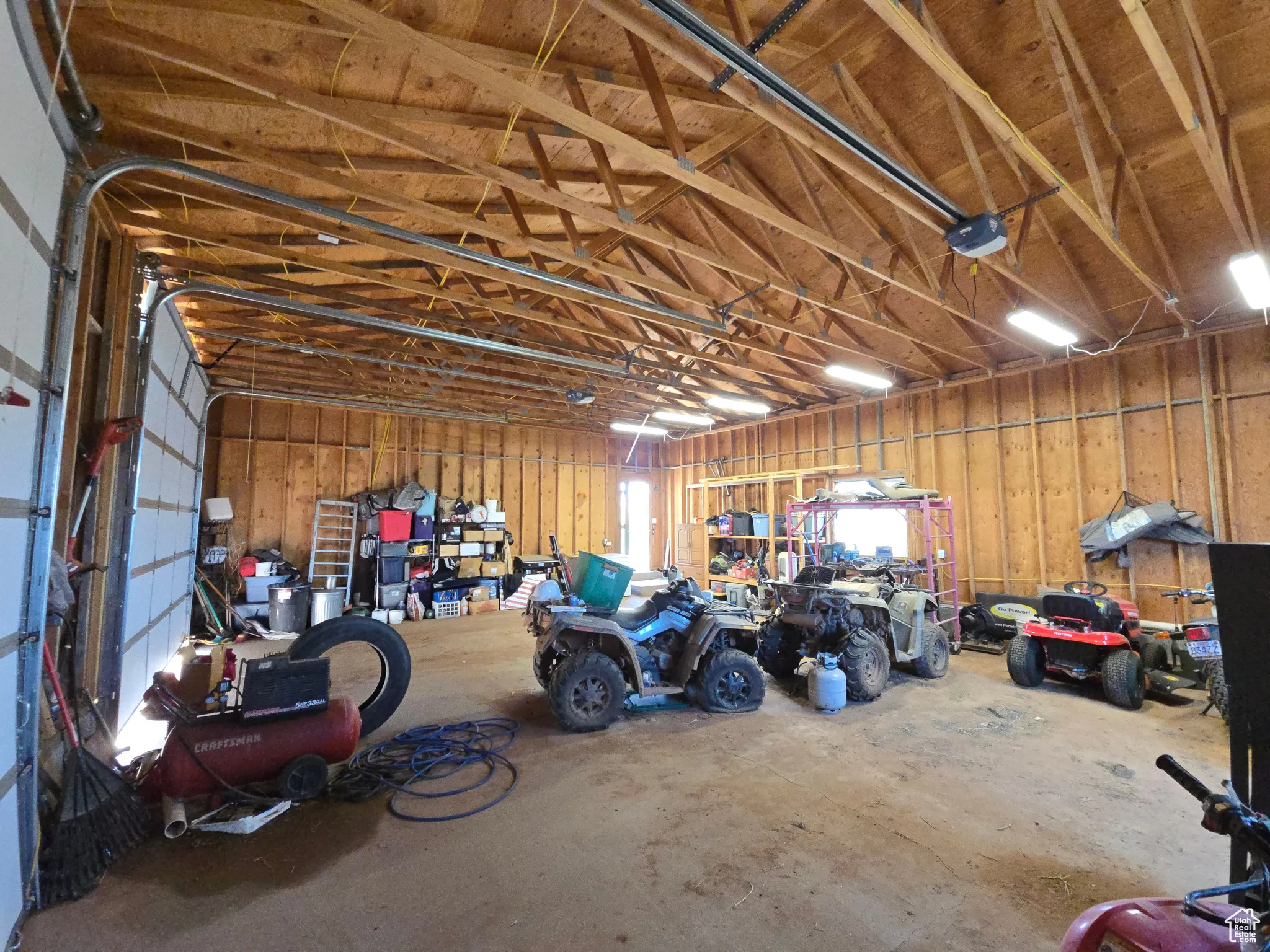 Garage featuring a garage door opener