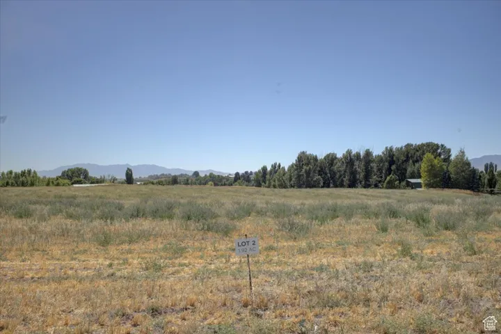 View of undeveloped land featuring rural landscape and a mountain backdrop
