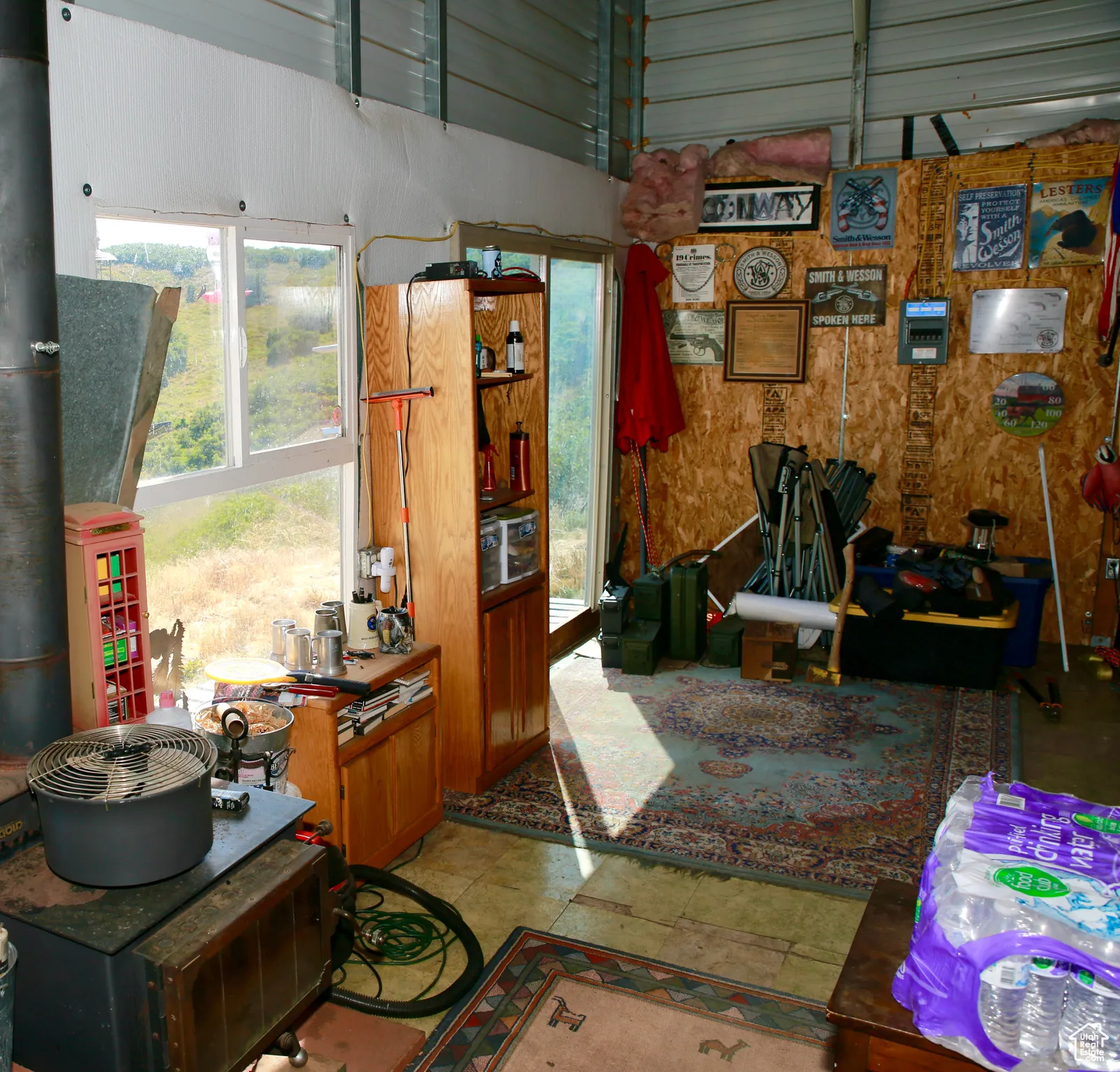 Misc room with wooden walls