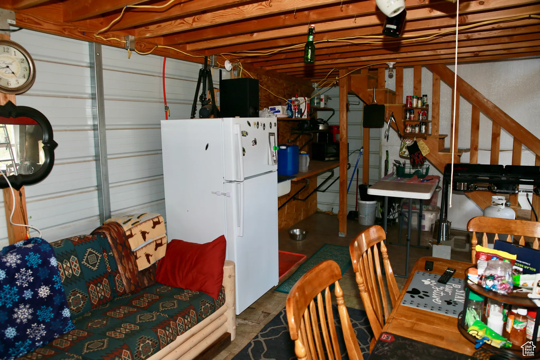 Garage with freestanding refrigerator