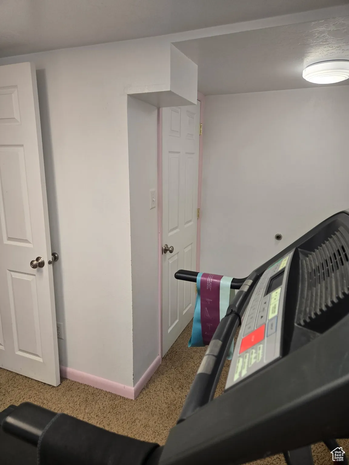 Exercise area featuring baseboards