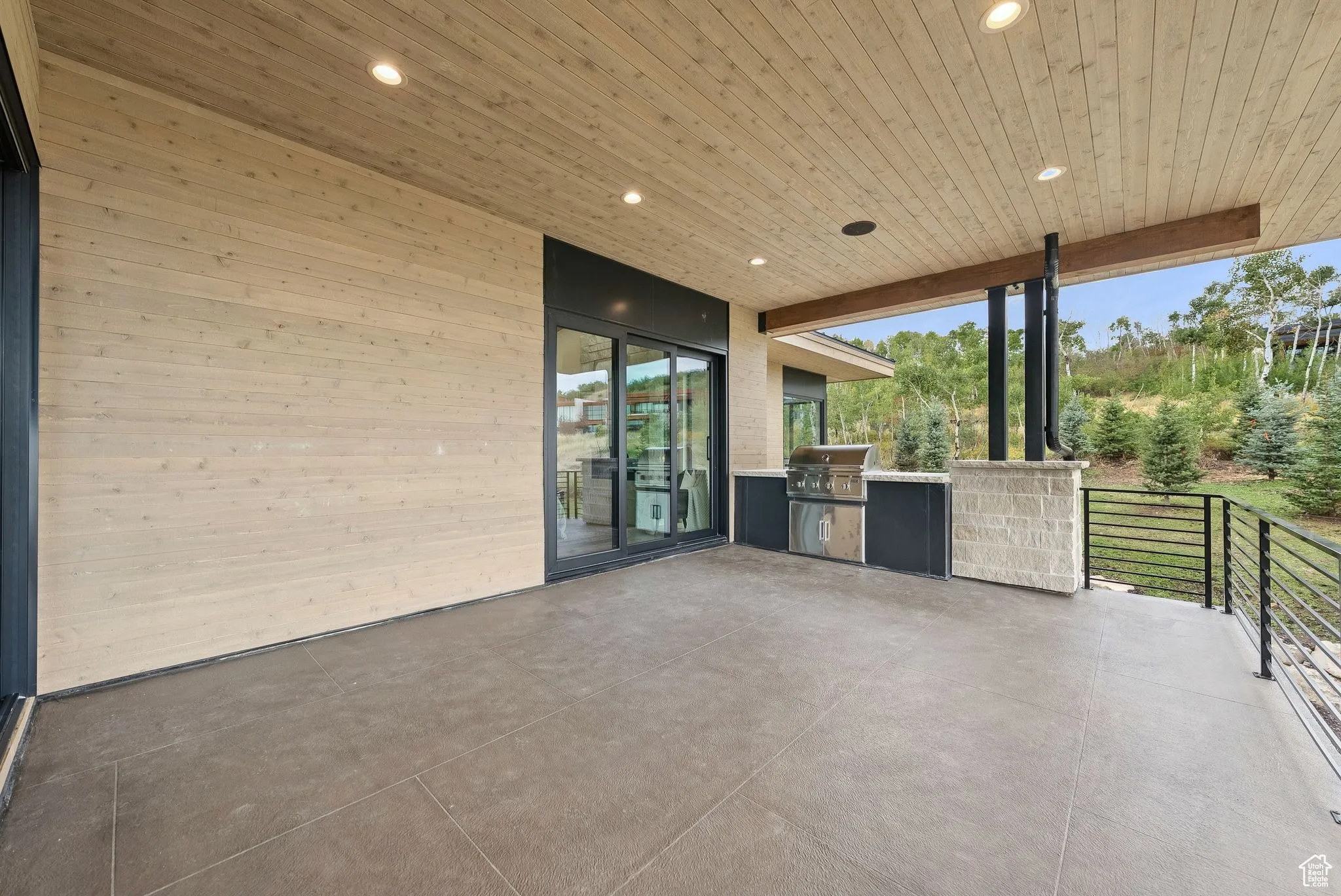 View of patio with an outdoor kitchen