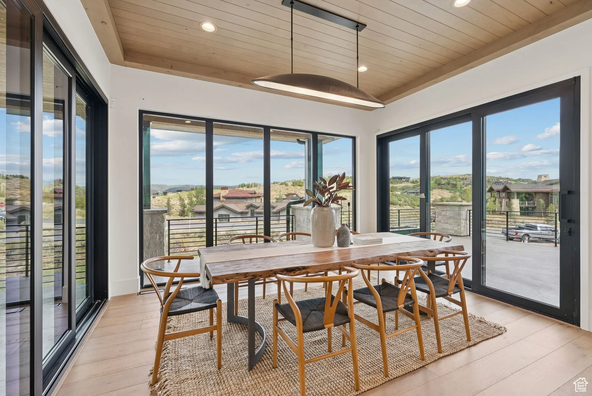 Dining space featuring wooden ceiling, light wood-style floors, and recessed lighting