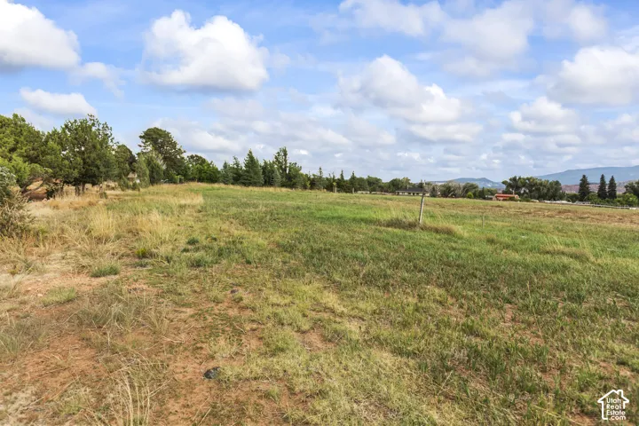 View of undeveloped land with rural landscape and mountains