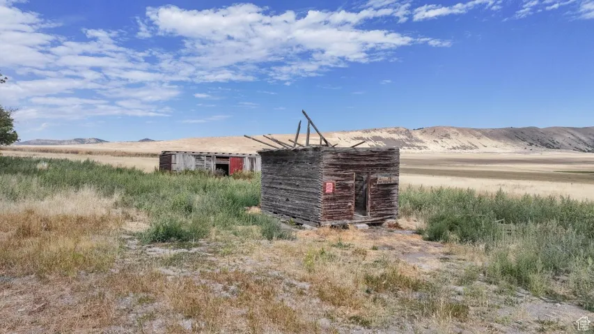 View of outbuilding featuring a mountain view