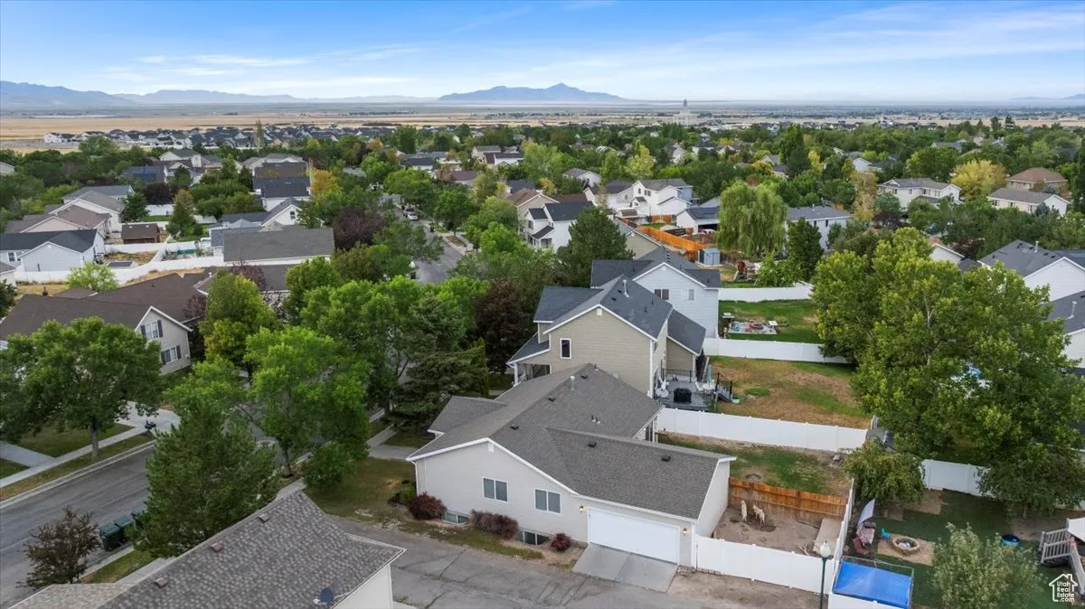 Aerial view of residential area with a mountain backdrop