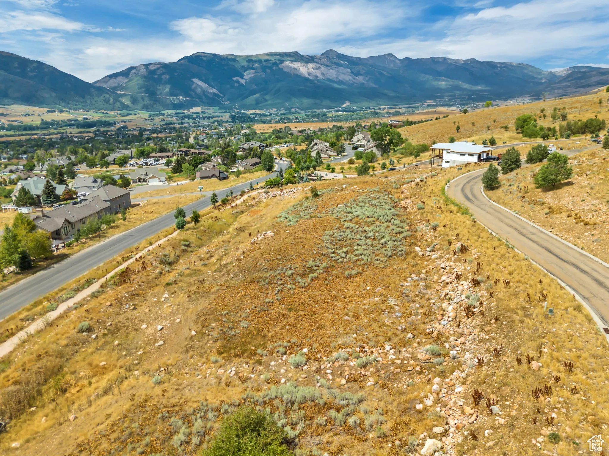 Drone / aerial view of a mountainous background