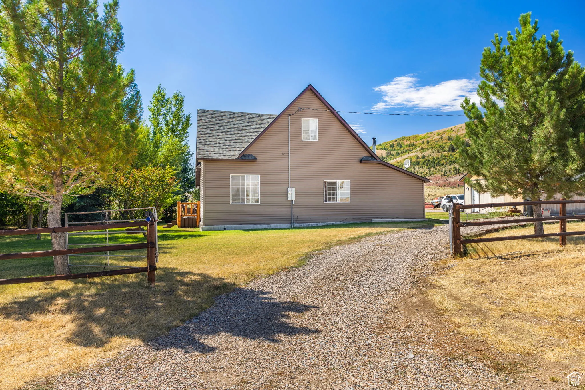 View of property exterior featuring a shingled roof