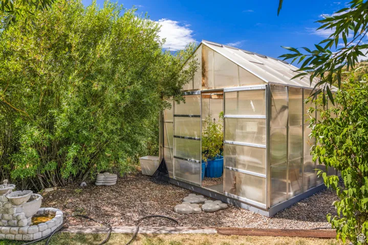 View of greenhouse featuring a sunroom