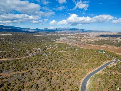 Overview of rural landscape featuring a mountainous background and a desert landscape