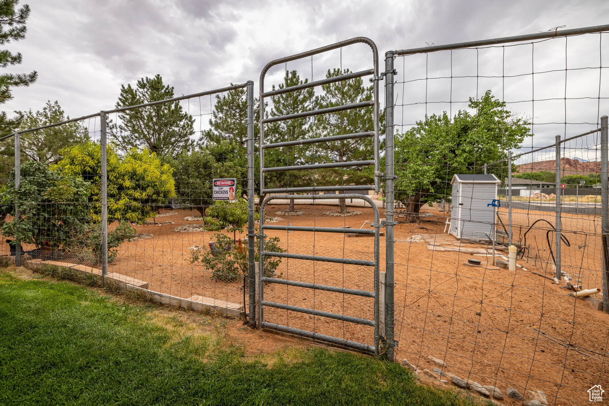 View of yard with a gate