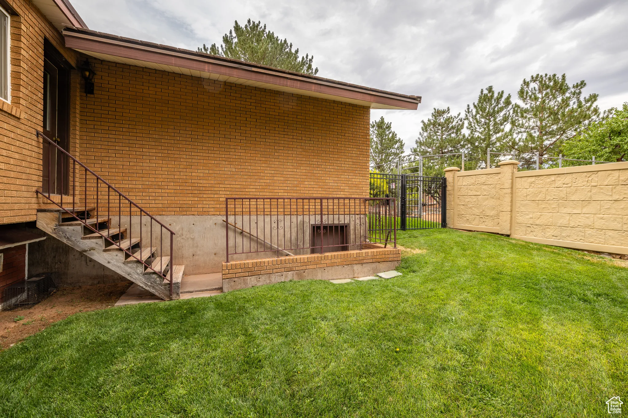 View of home's exterior with brick siding