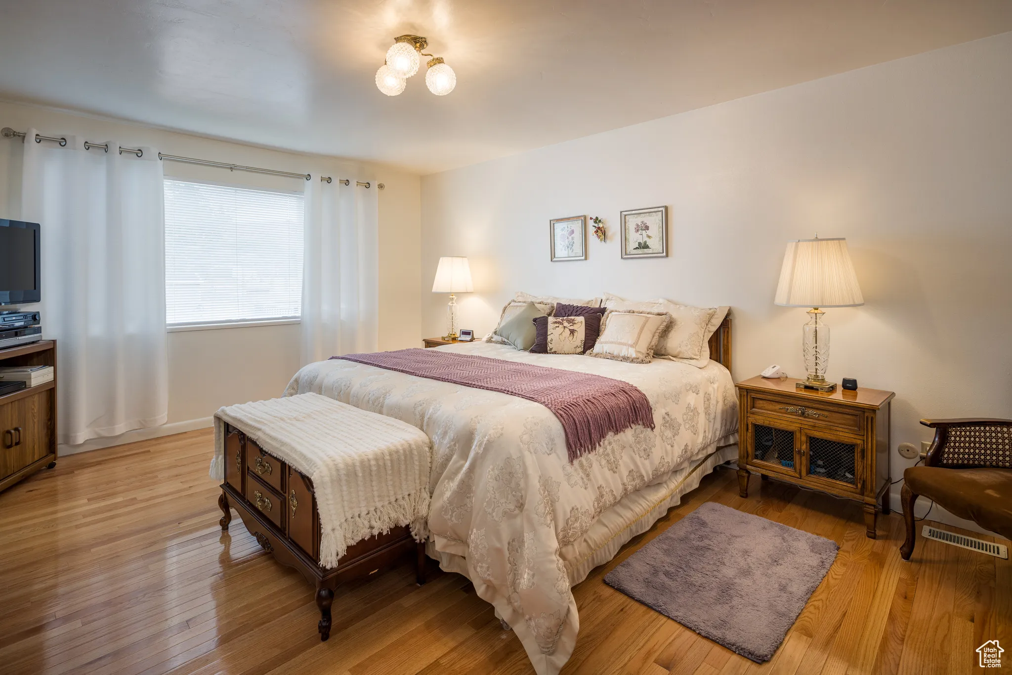 Bedroom with light wood-style flooring