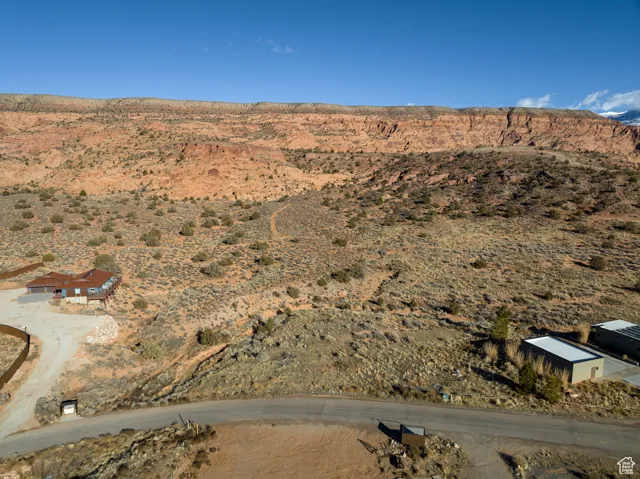 Aerial view of property's location with mountains and rural landscape