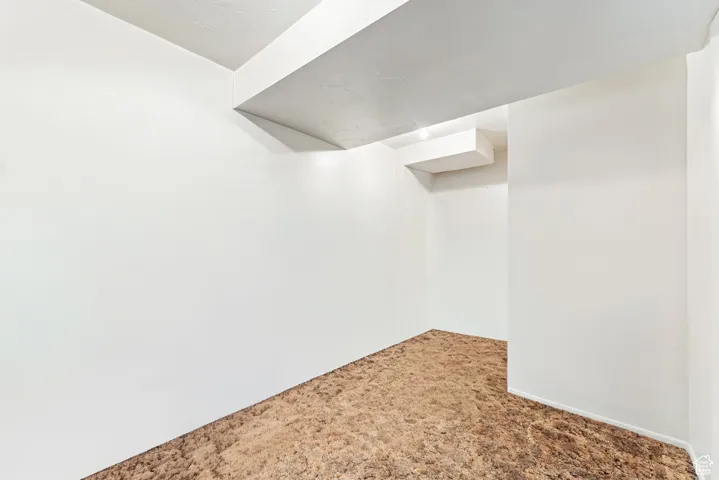 Finished below grade area with carpet flooring