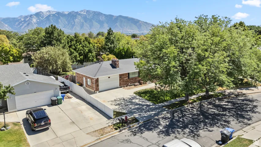 View of subject property with mountains
