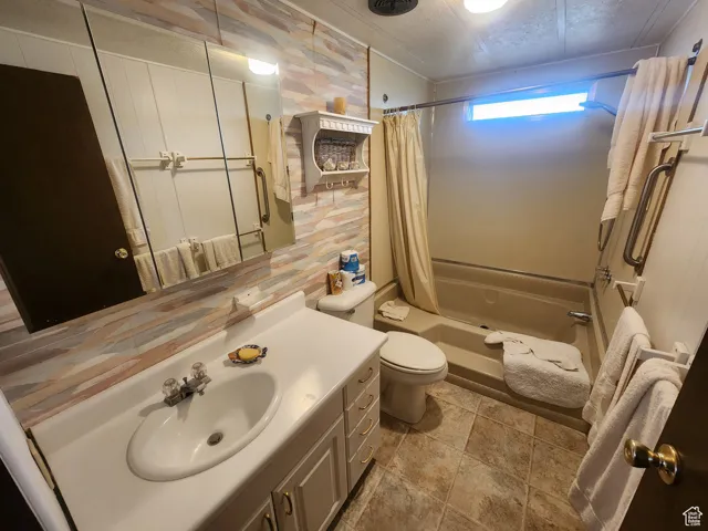 Bathroom featuring shower / tub combo
