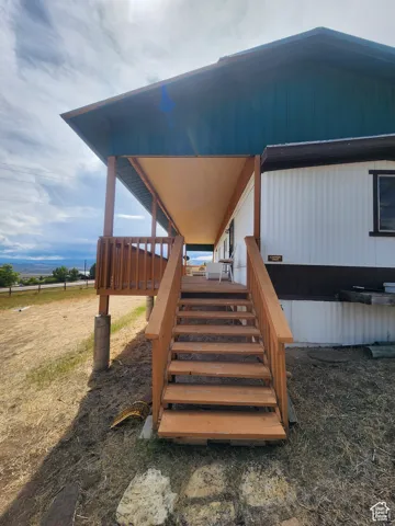 Deck featuring stairs