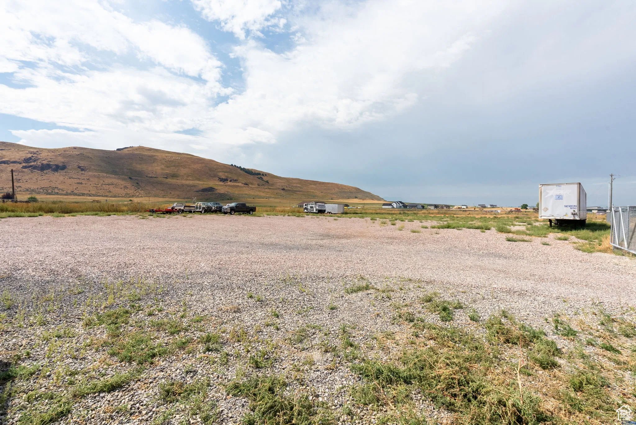 View of yard featuring a mountain view and a view of rural / pastoral area