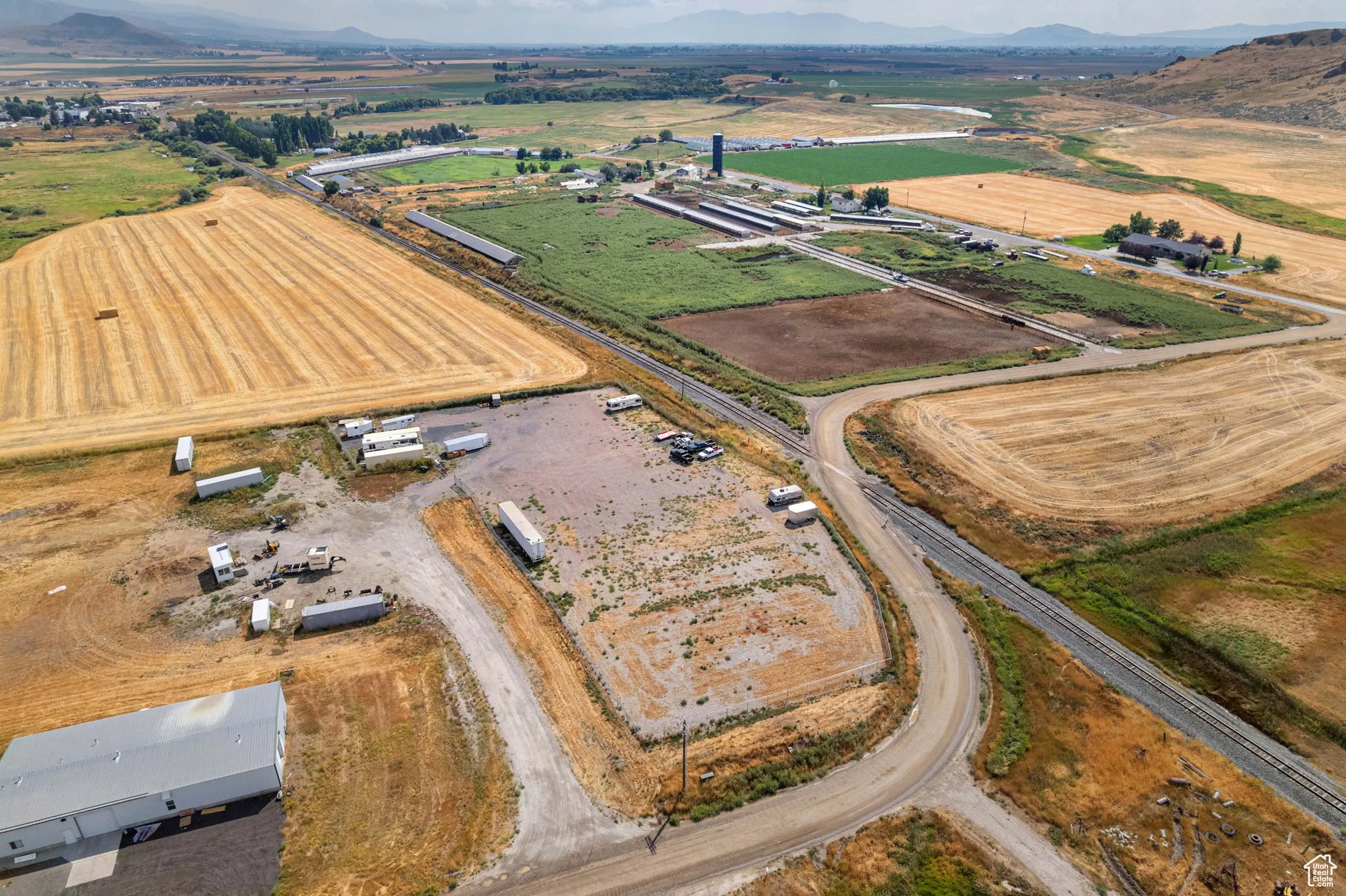 Aerial overview of property's location with mountains and rural landscape