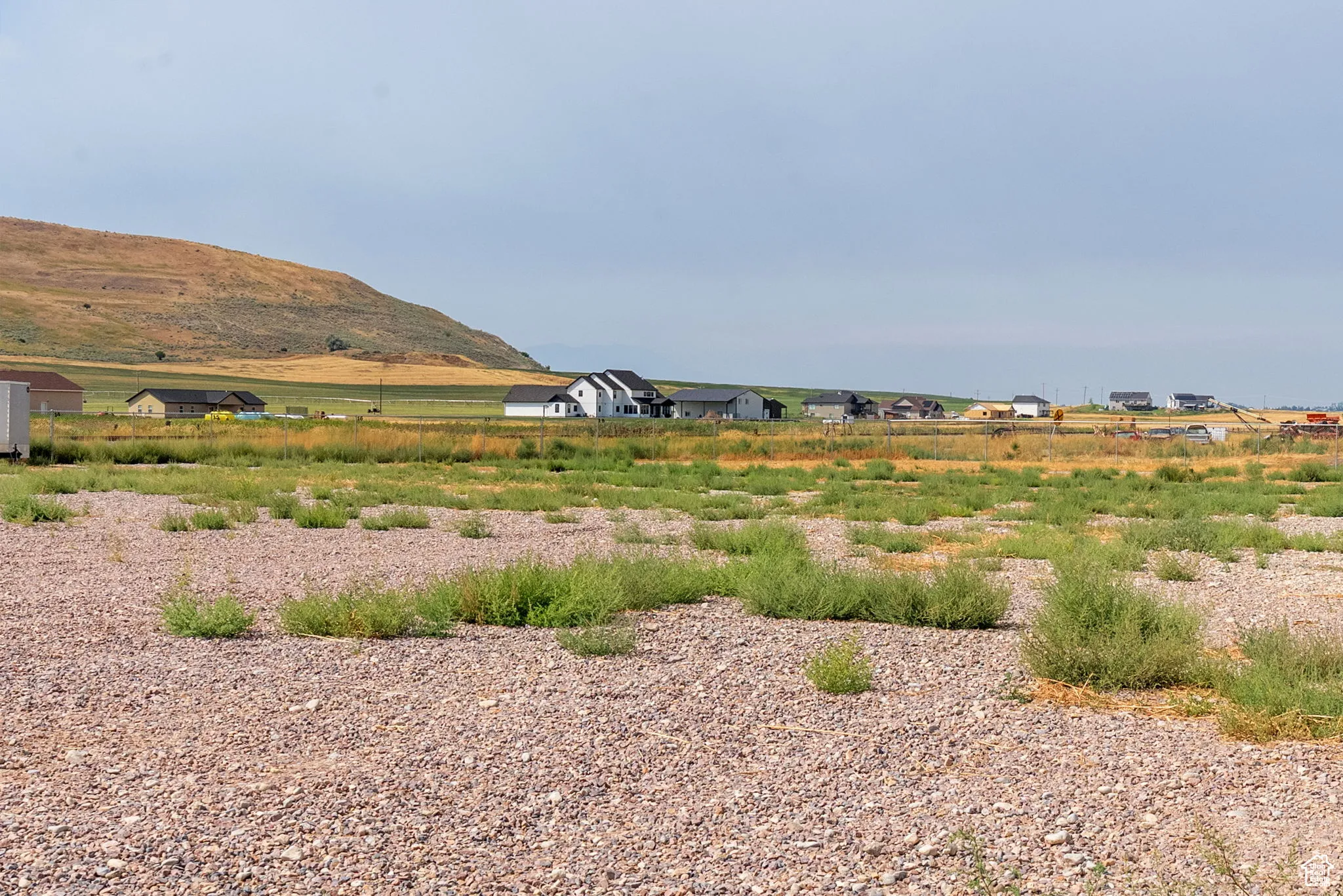 View of mountain background featuring rural landscape