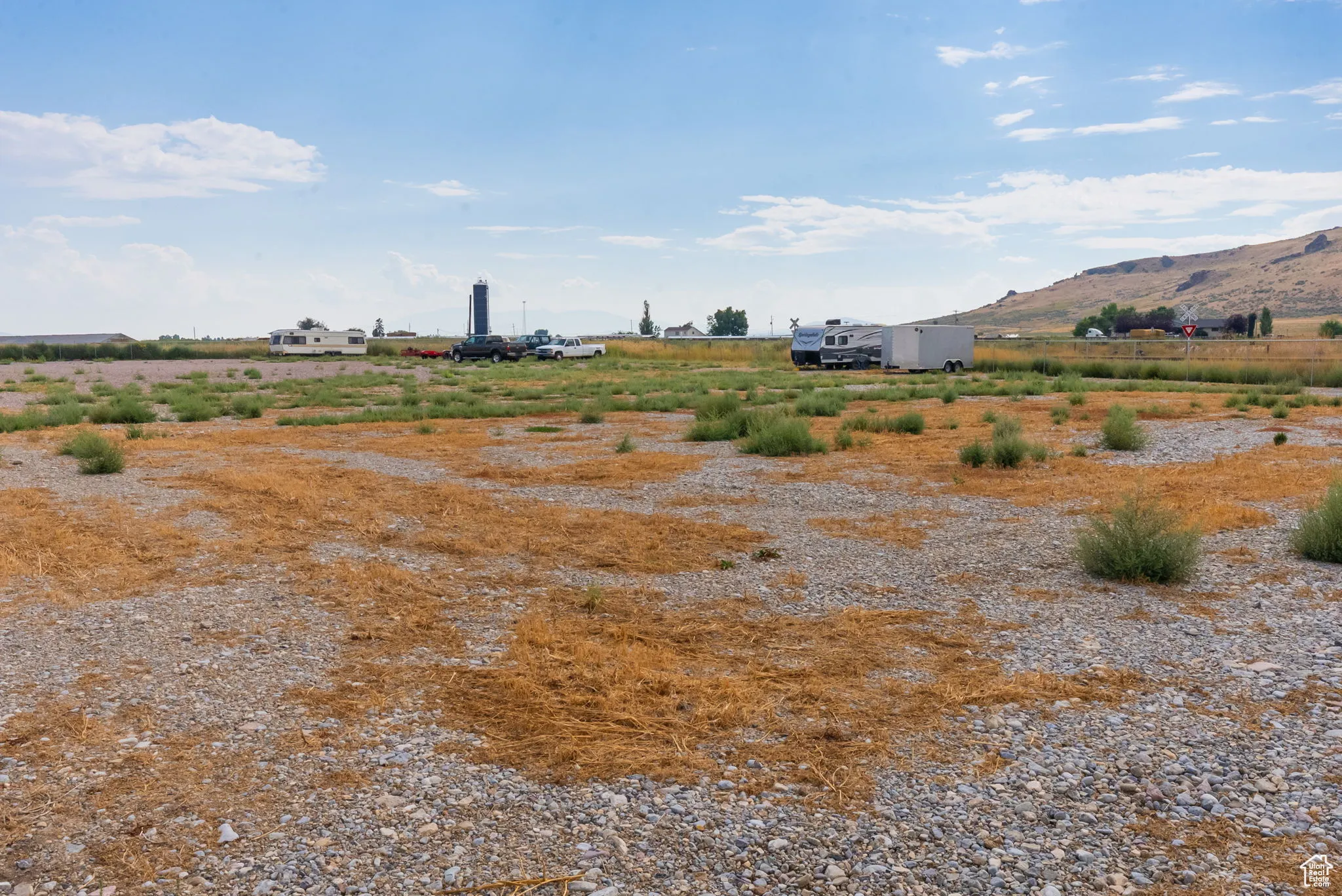 View of yard featuring a mountain view and a view of rural / pastoral area