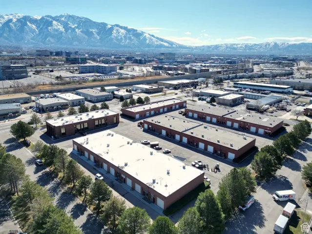 Drone / aerial view of mountains and industrial structures
