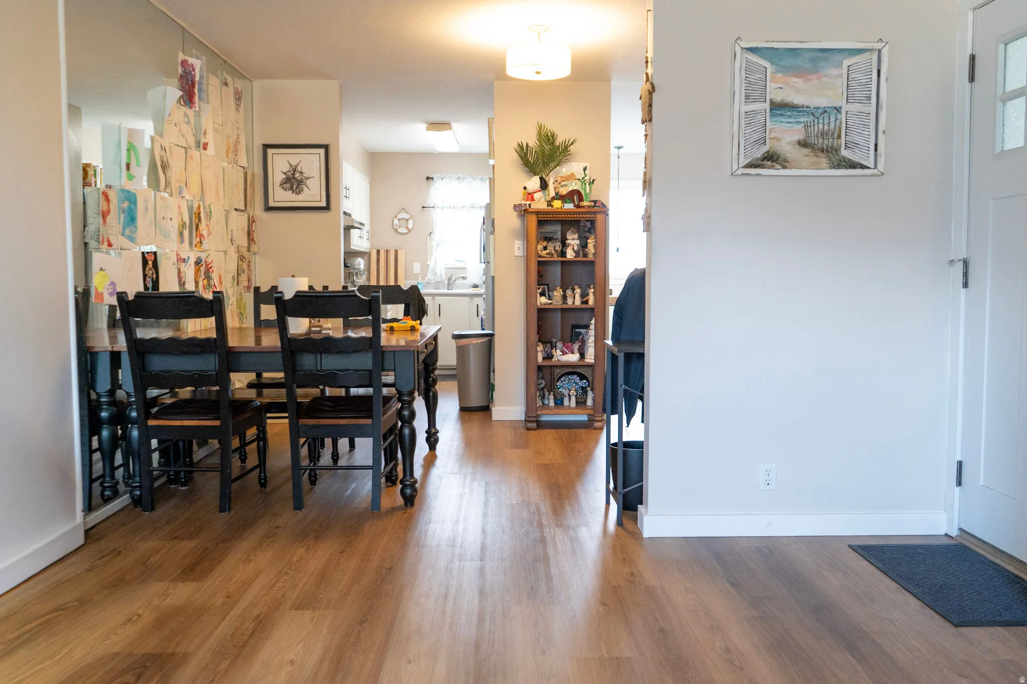 Dining area featuring wood finished floors