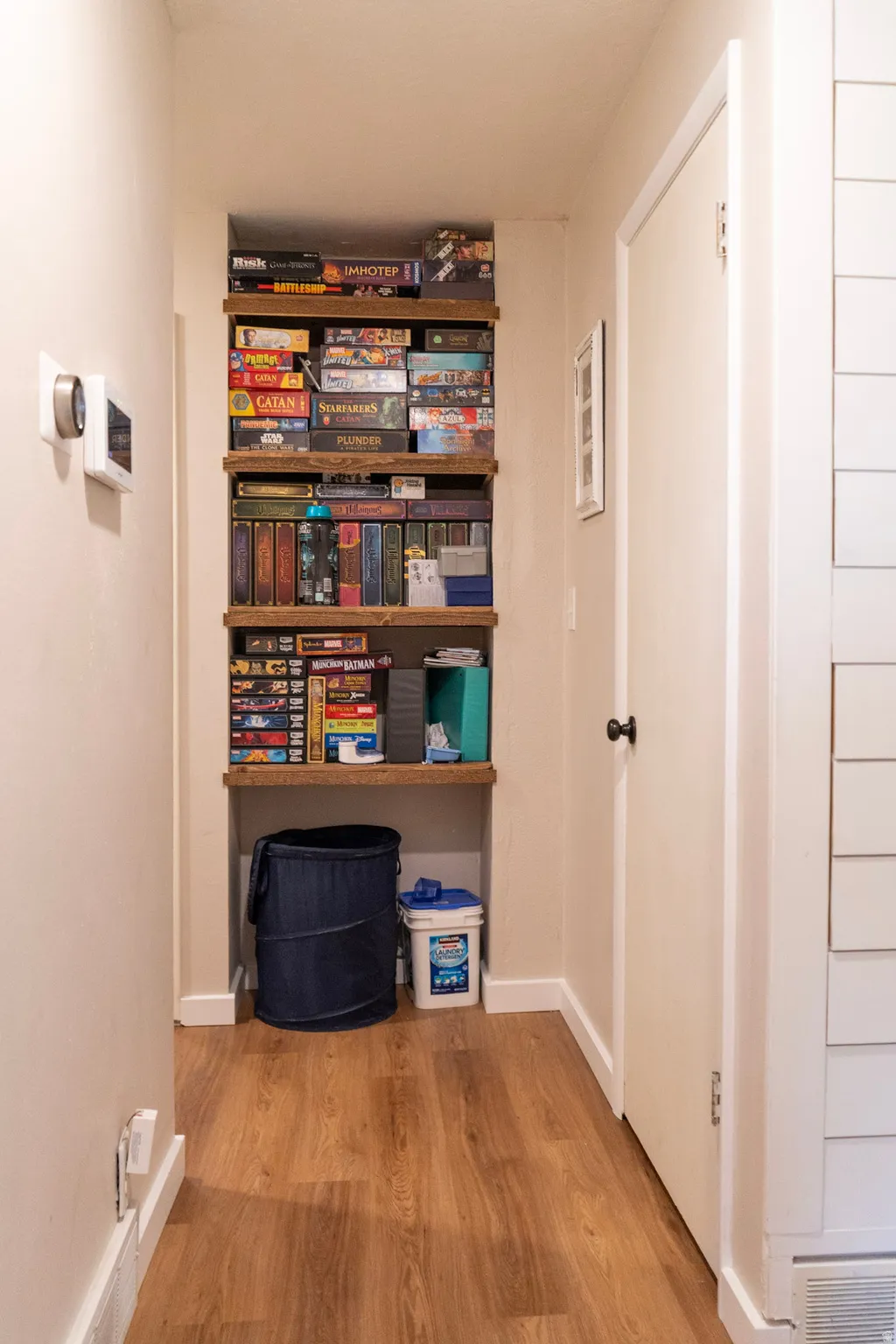 Interior space featuring light wood-style floors and baseboards