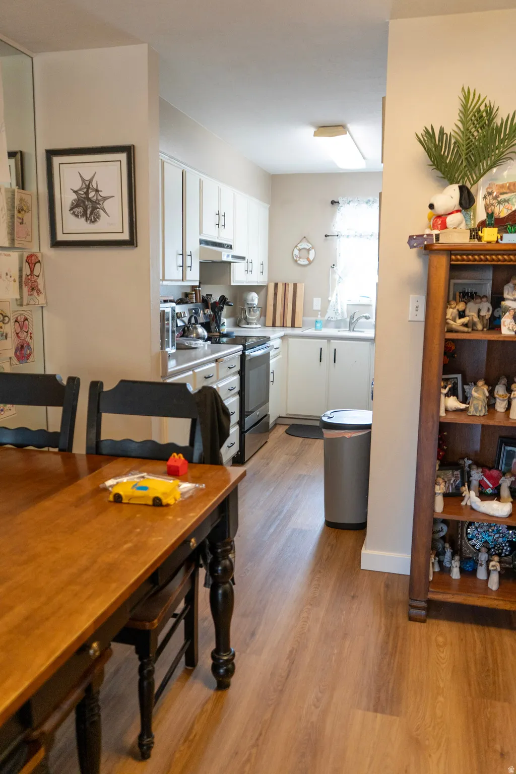 Dining space featuring light wood-style flooring