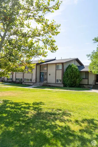 View of front of house with a front lawn
